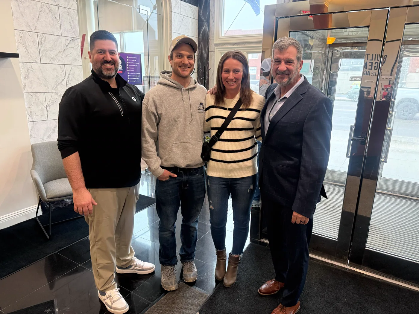 Honest Mortgage advisors with clients on closing day